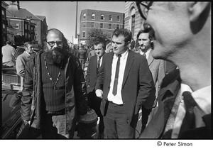 Jack Kerouac's funeral: outside church, Allen Ginsberg (left) with other mourners