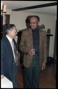 Fred Tillis (right) and Hui-Ming Wang at the book party for Robert H. Abel