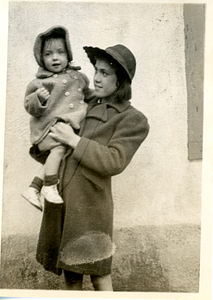 Theresa Ares holding her little sister, Carmen Ares