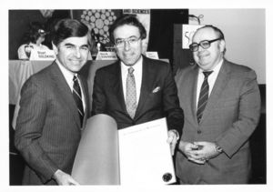 Governor Michael Dukakis, President Daniel H. Perlman (1980-1989), and Dean Michael R. Ronayne at the Suffolk University's College of Liberal Arts and Sciences CLAS 50th Anniversary Colloquium