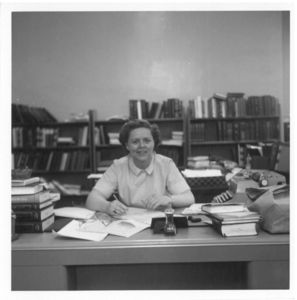 Suffolk University Law Librarian Patricia I. Brown sitting at desk