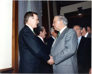 President George Bush shaking hands with John Joseph Moakley