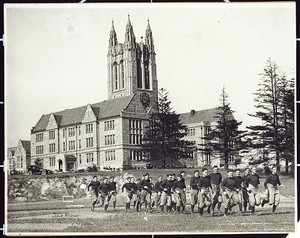 Boston College football team going for a run in front of Gasson Hall