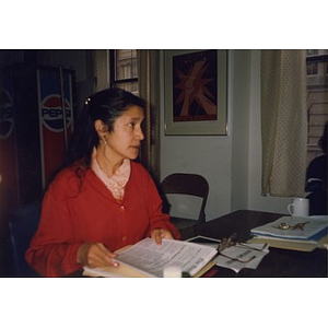 Clara L. Garcia, Inquilinos Boricuas en Acción's Executive Director, at a staff meeting.