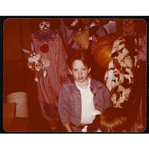 Children pose in Halloween costumes