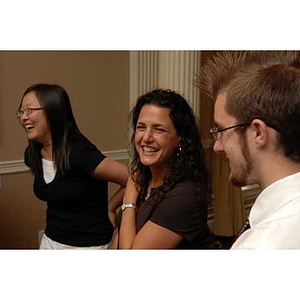 Nicole Manganaro laughs with two Torch Scholars at the Manganaro Luncheon