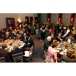 Guests sit around tables at The National Council Dinner