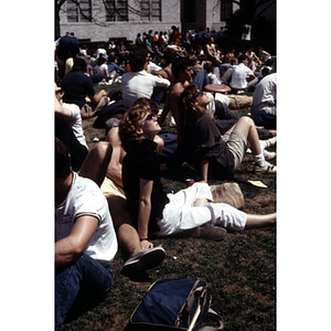 Students sitting in the quad on Greek Day