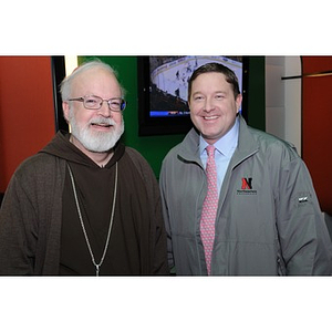 Cardinal O'Malley and a guest at the Beanpot Reception