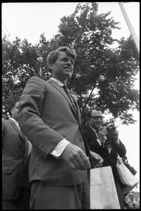 Robert F. Kennedy atop the outdoor stage while stumping for Democratic candidates in the northern Midwest