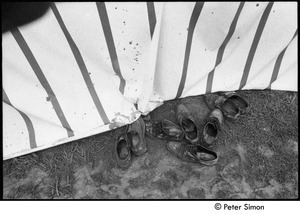 Muddy shoes outside a tent, Resurrection City