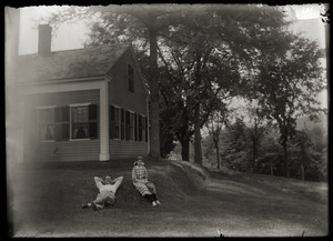 Couple in front of house, Greenwich, Mass.