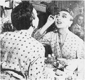 Lucian Phelps Putting on Makeup