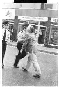 Nationalist protest at march by Ian Paisley, Downpatrick. One of these shots is of an RUC officer kneeing a protestor in the groin. This shot appeared on the front page of An Phoblact Republican News