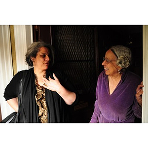 Adelaide Cromwell chats with Lolita Parker, Jr. in the doorway of Cromwell's home
