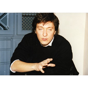 Claudio Ragazzi gesturing during a staff retreat.