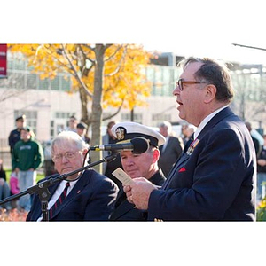 Unidentified man speaks at the Veterans Memorial dedication ceremony