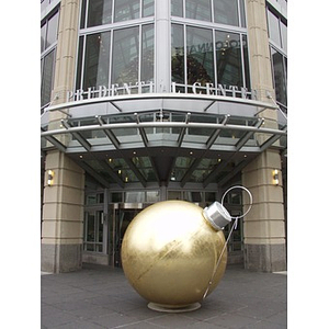 Oversize Christmas bulb ornament in front of the entrance to the Prudential Center