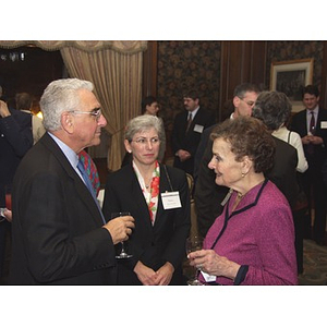 John Hatsopoulos speaking with guests at the gala dinner in his honor