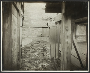 Interior view of the Browne House, south end of chimney as seen on ground floor in staircase well, Watertown, Mass., May 21, 1919