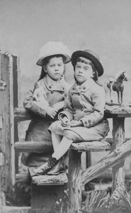 Harry (right) and Frances Foote: studio portrait at a fence crossing