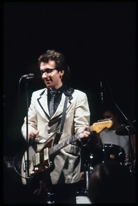 Elvis Costello and the Attractions in concert: Costello on guitar