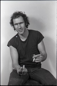 Studio portrait of Richard Safft, seated on a stool