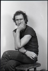 Studio portrait of Richard Safft, seated on a stool