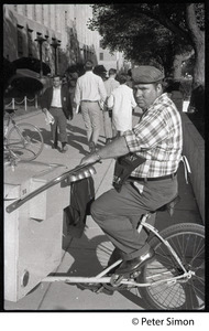 Street vendor selling ice cream from his cycle, Boston University