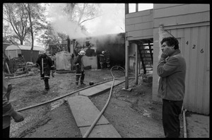 Man in anguish after learning that his garage was gutted by fire, and the family's cat was trapped inside