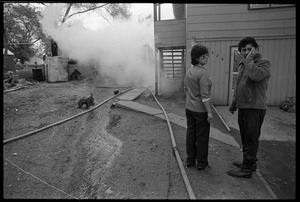 Man in anguish after learning that his garage was gutted by fire, and the family's cat was trapped inside