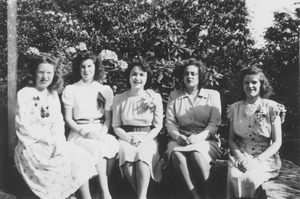 Class of 1945 friends sitting outdoors