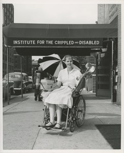 Woman in specially equipped wheelchair