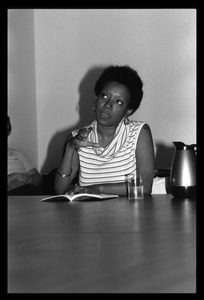 Nancy Morejón, Cuban writer, speaking at the Institute for the Humanities, UMass Amherst, seated at a table for discussion