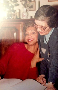 A Photograph of Marlow Monique Dickson Embracing Another Person