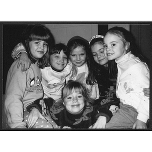 Group of young girls sitting together