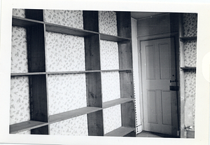 Shelves against the wall in the interior of the Parkman House