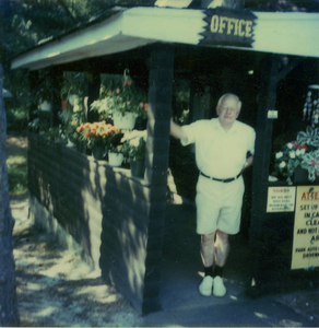 Malcolm S. Currier, campground co-founder, in front of original office