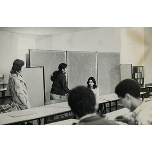 Five Hispanic American teenagers in a classroom at La Alianza Hispana headquarters, Roxbury, Mass