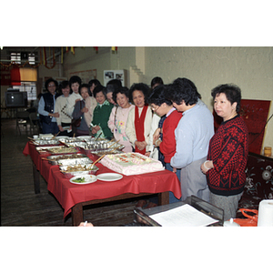 Cake-cutting at an International Women's Day event