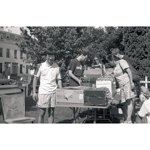 Shoppers at an outdoor sale event