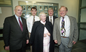 Dedication ceremonies for the Conte Polymer Center: David K. Scott (right rear) with Corinne Conte and family