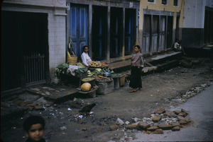 A vegetable seller on market day