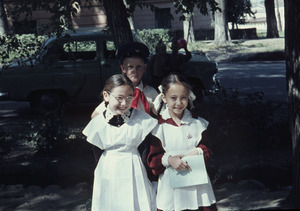 Three children in uniforms