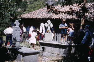 Playing on tombstone in Labuništa churchyard