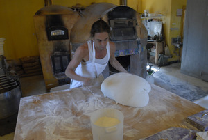 Hungry Ghost Bread: owner and baker Jonathan C. Stevens working pastry dough