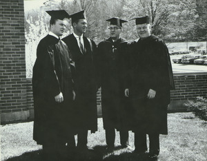 Charter Day: Gordon Oakes, Governor Endicott Peabody, President John W. Lederle, and Bishop Christopher J. Weldon outside Totman Gymnasium