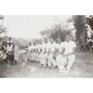 Breezy Meadows Camp staff members, seated on a bench