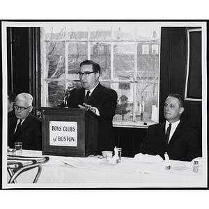 State Senator John E. Powers speaking at the podium during a Boys' Clubs of Boston awards event