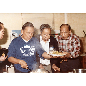 Chinese Progressive Association members at a community dinner